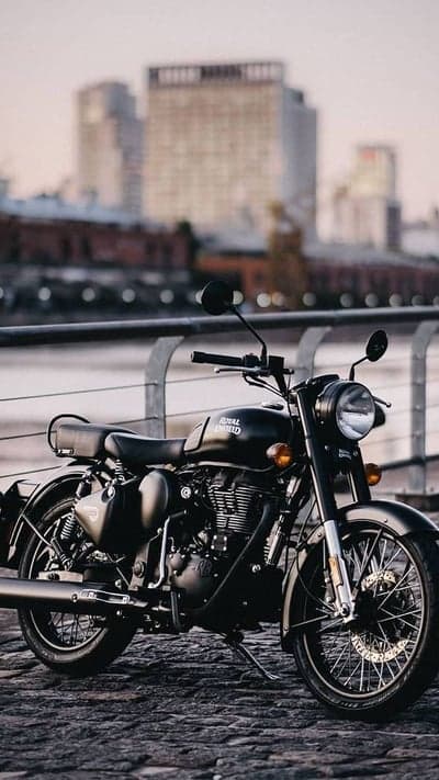 Vintage Royal Enfield Bike Urban Waterfront Wallpaper