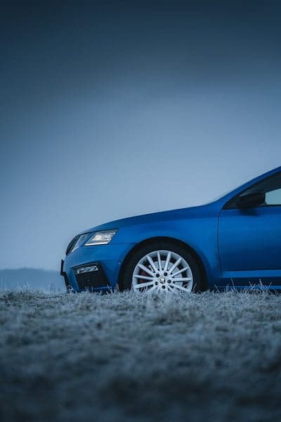 Blue Skoda Octavia Frosty Winter Morning Phone Wallpaper