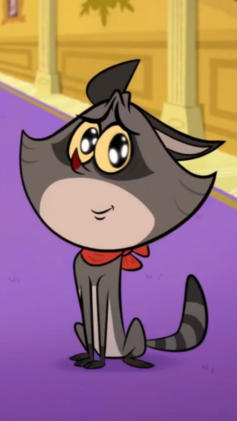 Gray kitten with large yellow eyes and a red neck bandana sits on a purple surface within a yellow hallway.
