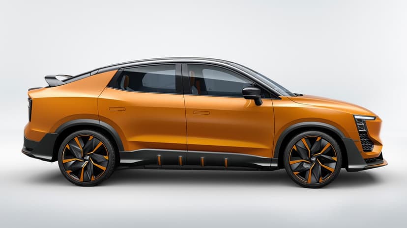 Bright orange electric crossover car side profile on a clean white background with futuristic black accents.