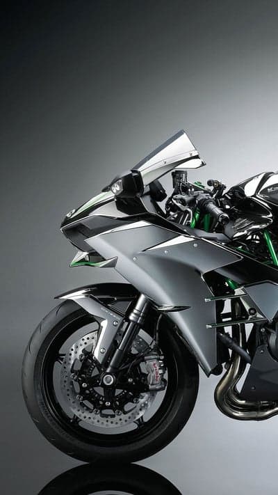 Sleek Kawasaki motorcycle with striking green accents