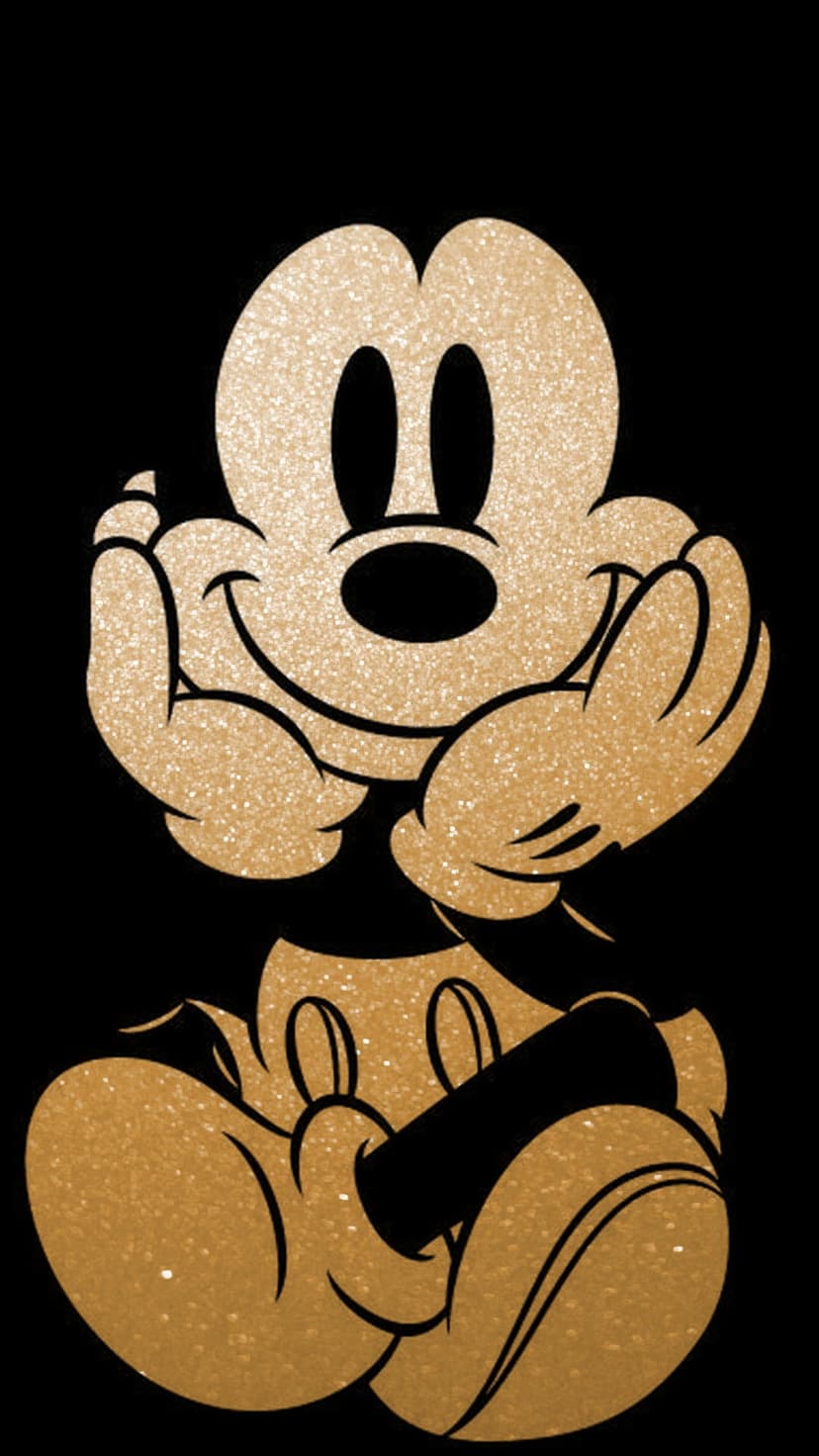 Mickey Mouse silhouette shimmering with golden glitter particles against a dark, high-contrast black background.