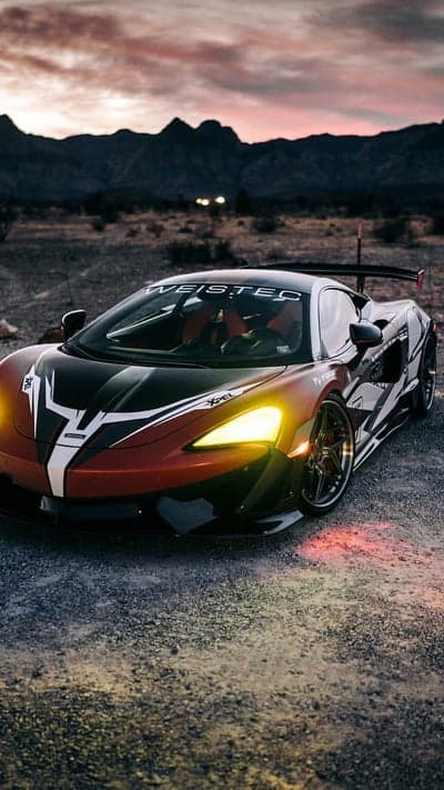Red McLaren Supercar Desert Sunset Phone Background