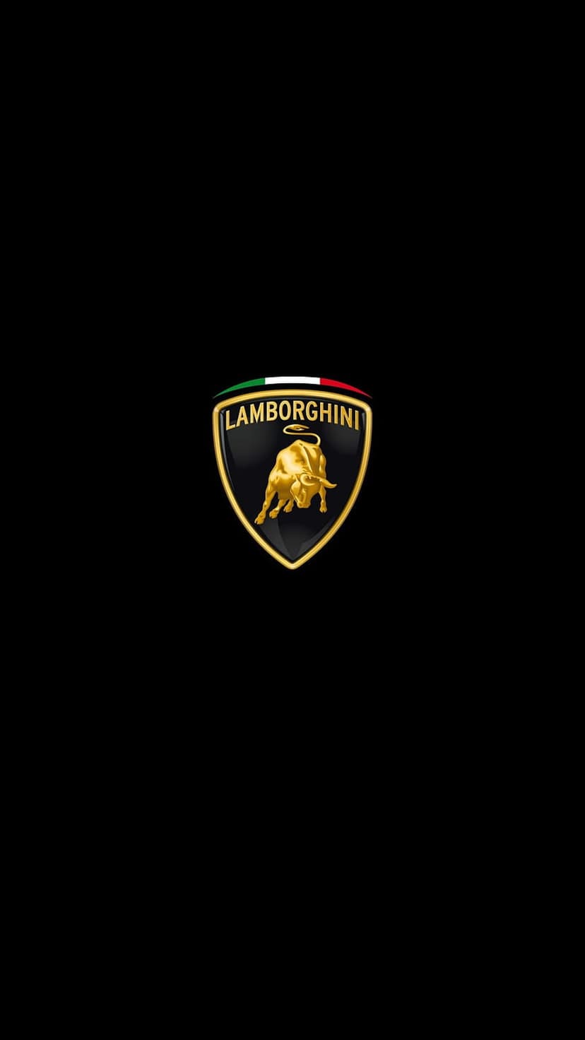Gold Lamborghini shield with a charging bull emblem centered on a clean, solid matte black vertical surface.