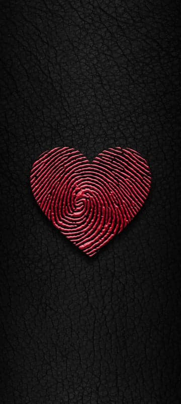 Red Fingerprint Heart on Black Textured Background