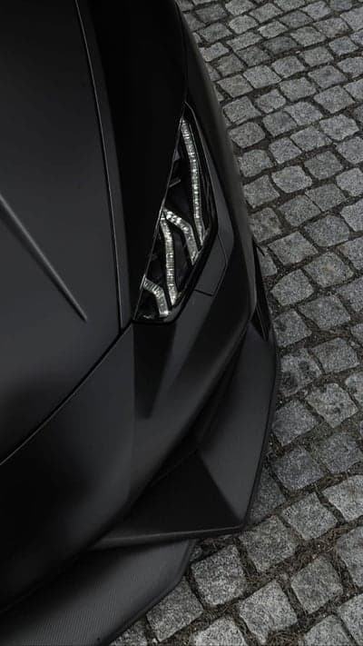 Stealth Black Supercar Headlight Cobblestone Wallpaper
