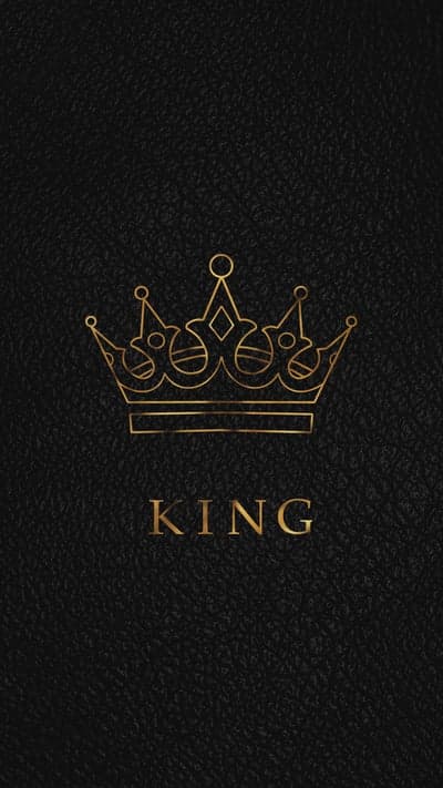 Golden King Crown and Text on Black Leather Background