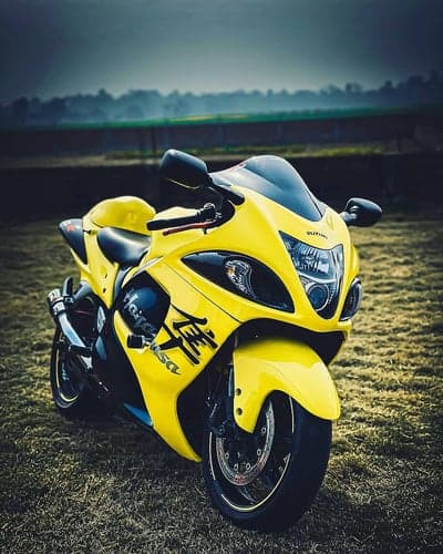 Bright Yellow Suzuki Hayabusa Motorcycle on Grassy Field