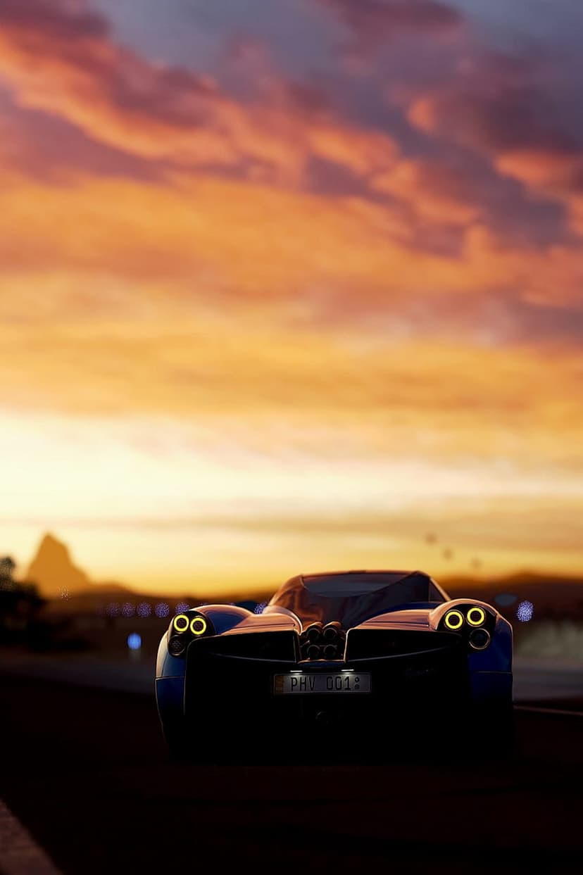 Sleek supercar silhouette with glowing red taillights positioned against a vibrant orange and purple sunset sky.