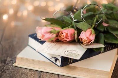 Vintage Romance: Roses, Books, and Glasses