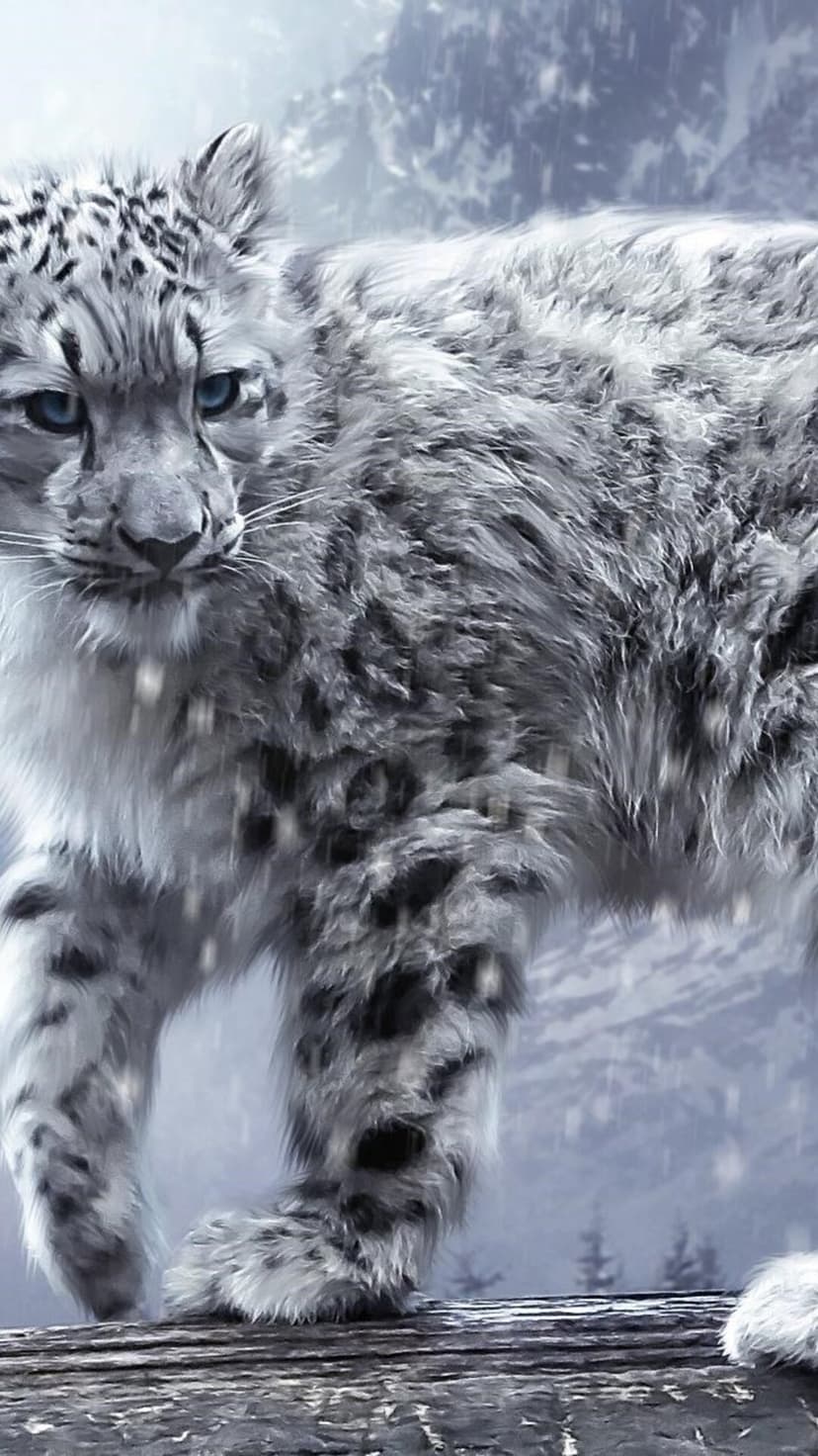 Snow leopard with blue eyes sits amidst falling snow and rocky, frost-covered terrain in a vertical portrait.