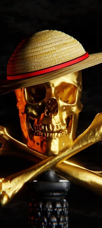 Golden Skull with Straw Hat and Crossed Bones