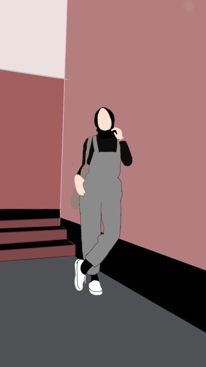 Woman in a hijab, black turtleneck, and grey overalls stands against a pink wall with a tan bag on her shoulder.