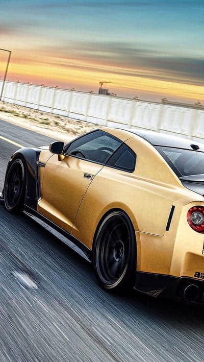 Golden Nissan GT-R Sunset Highway Mobile Wallpaper