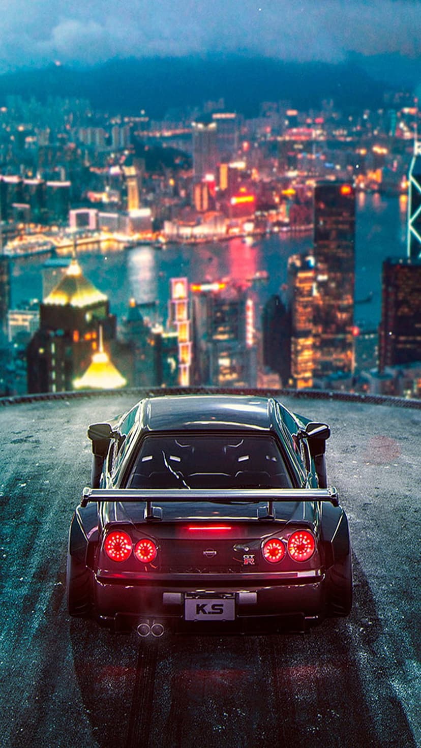 Dark sports car with glowing red taillights parked on a wet road facing a vibrant neon city skyline at night.