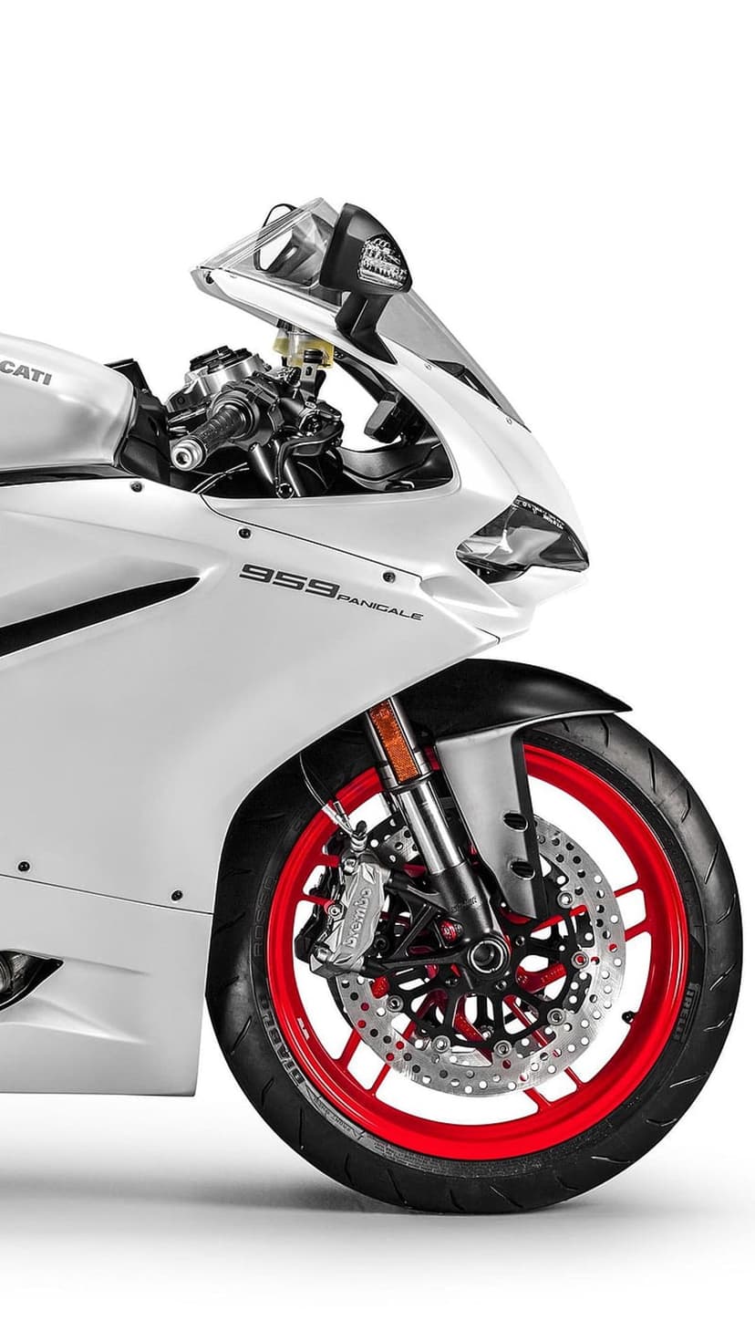 Ducati 959 Panigale front view with white fairings, red wheels, and dual headlights on a neutral background.