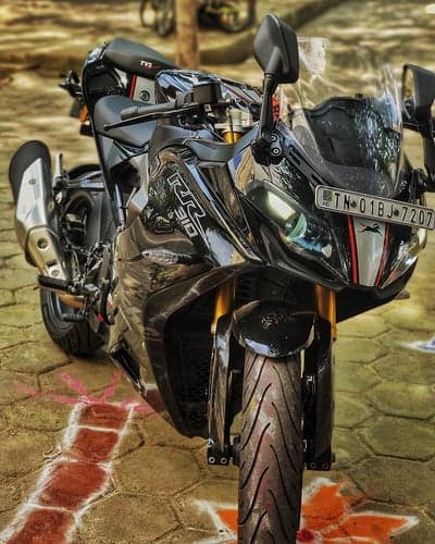 TVS Apache RR 310 Black Motorcycle on Pavement
