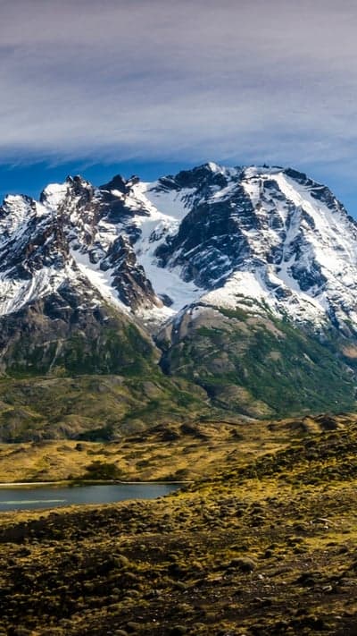 Majestic Peaks- Snow-Capped Grandeur Above a Serene Lake