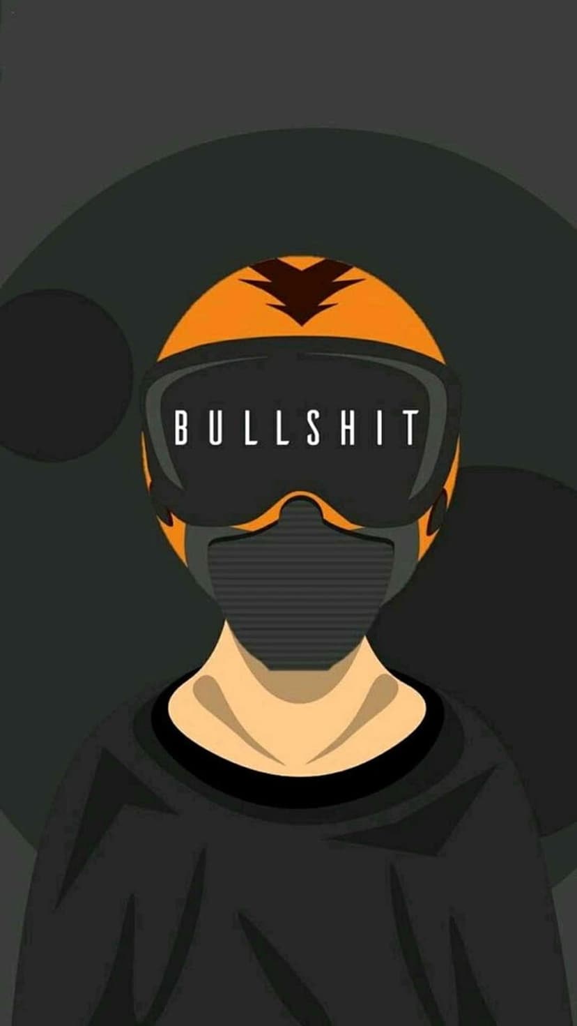 Person in an orange helmet and respirator mask wears goggles with white bullshit text against a dark background.