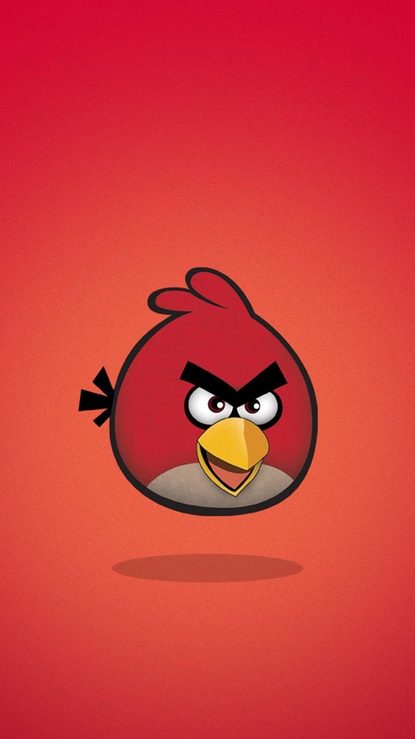 Red Angry Bird with thick black eyebrows and yellow beak floating over a red textured background.