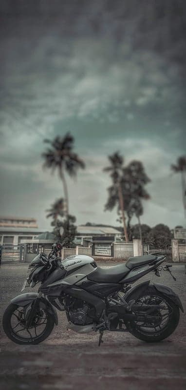 Striking Motorcycle Parked Outdoors Under Cloudy Sky