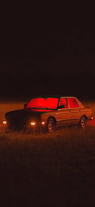 Cinematic Vintage Automobile Red Light Phone Wallpaper