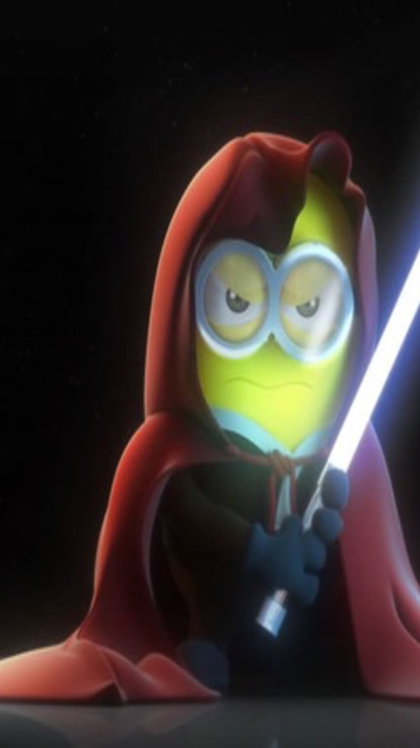 Minion wearing a red hooded robe and goggles holds a glowing blue lightsaber in a dark starry space environment.