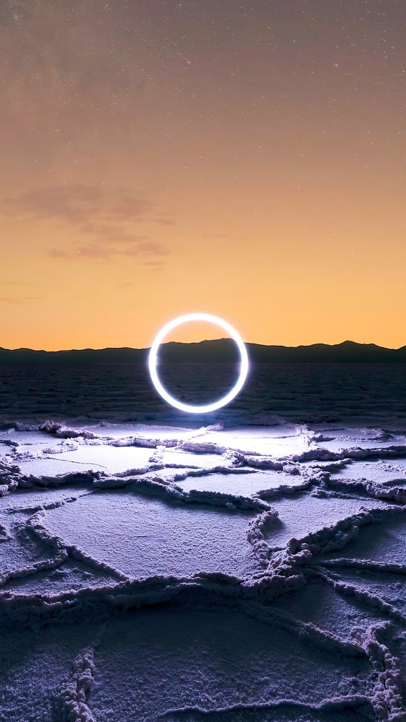 Glowing white ring hovers over a cracked salt flat landscape with distant mountains under a twilight horizon.