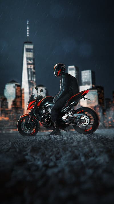 Motorcyclist in Rainy Cityscape at Night