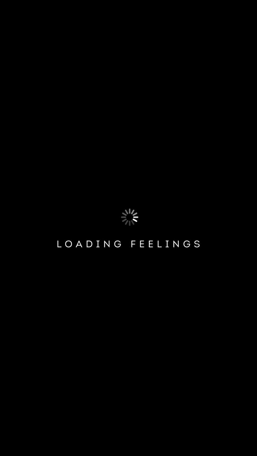 Loading Feelings text in white sans-serif below a circular spinner icon on a solid black background.