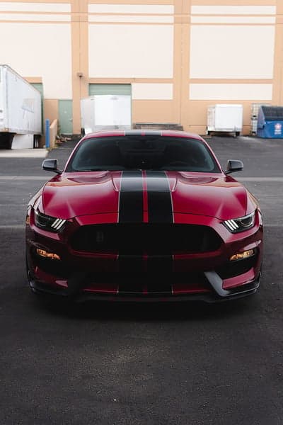 Red Ford Mustang GT with Black Stripes