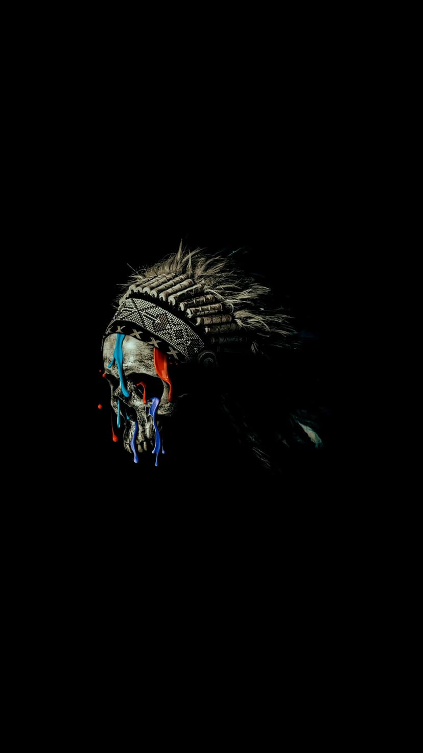 Tribal skull in a feathered headdress with red and blue paint dripping from eye sockets on a black background.