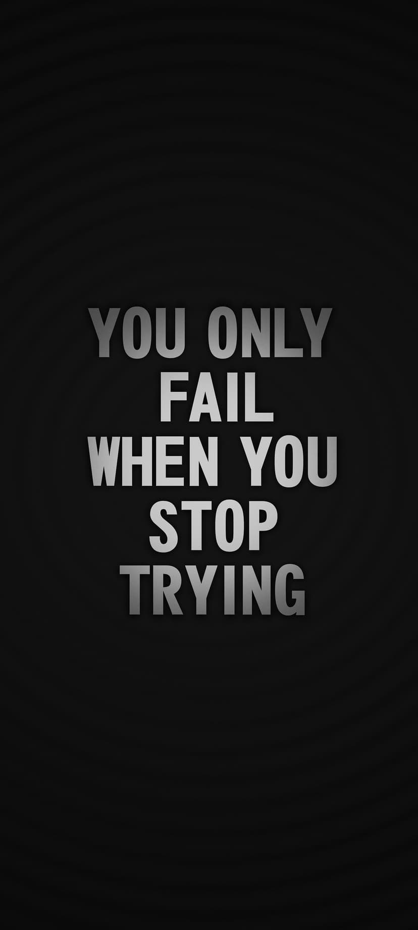 White typography featuring the quote You Only Fail When You Stop Trying centered on a dark textured background.