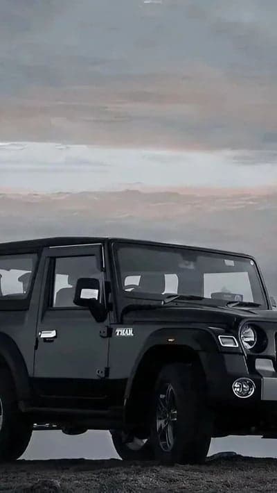 Dark Mahindra Thar SUV Dramatic Sky Mobile Wallpaper