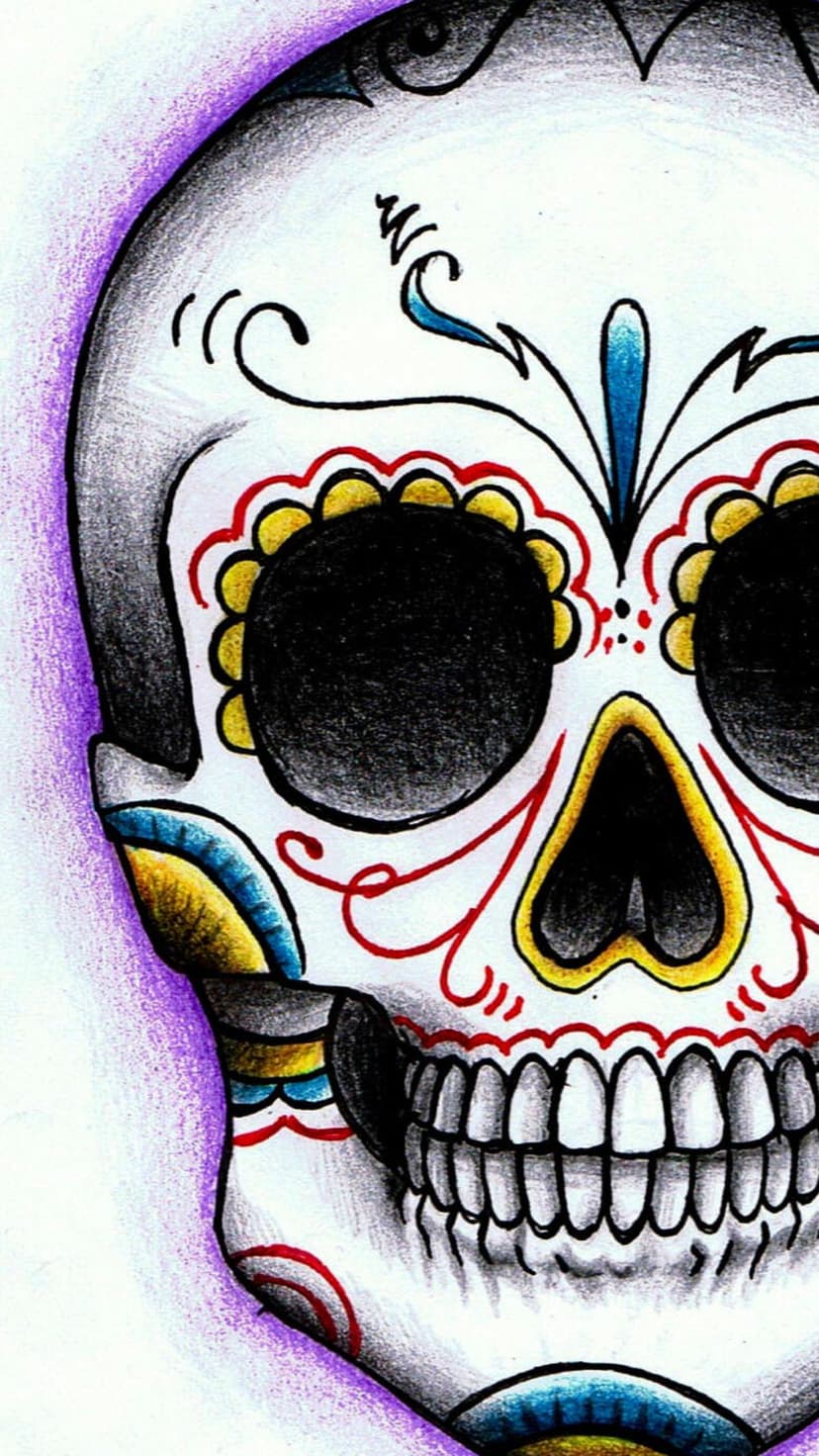 Sugar skull with red and yellow floral patterns and blue scrollwork glows with a soft purple ambient light.