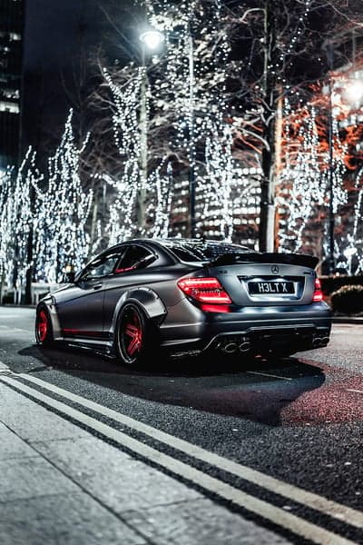 Mercedes C63 AMG Coupe at Night with Christmas Lights