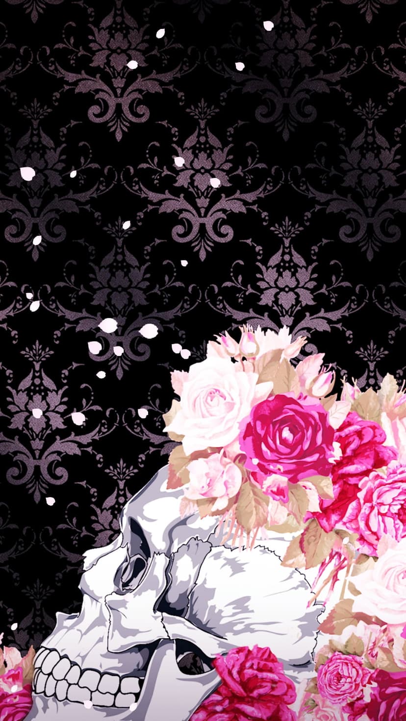 Human skull decorated with pink and white rose blossoms against a dark charcoal damask floral patterned backdrop.