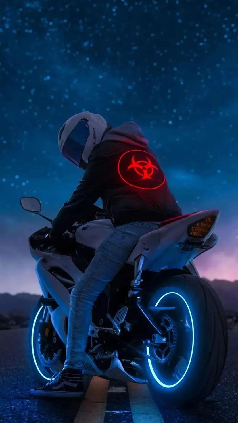 Motorcyclist with a glowing red biohazard jacket logo rides a bike with blue neon wheels under a starry sky.