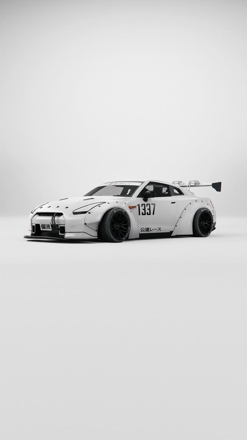 Nissan GT-R with a white widebody kit and racing decals stands against a minimalist white studio background.