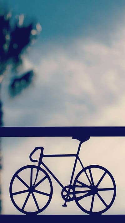 Minimalist Bicycle Silhouette Cloud Wallpaper for Phone