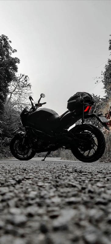 Atmospheric Biker Silhouette Gravel Road Mobile Wallpaper