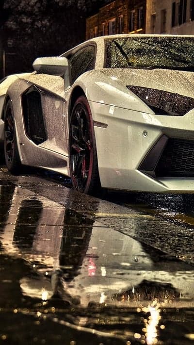 Rainy Night Lamborghini Aventador Reflection on Wet Street