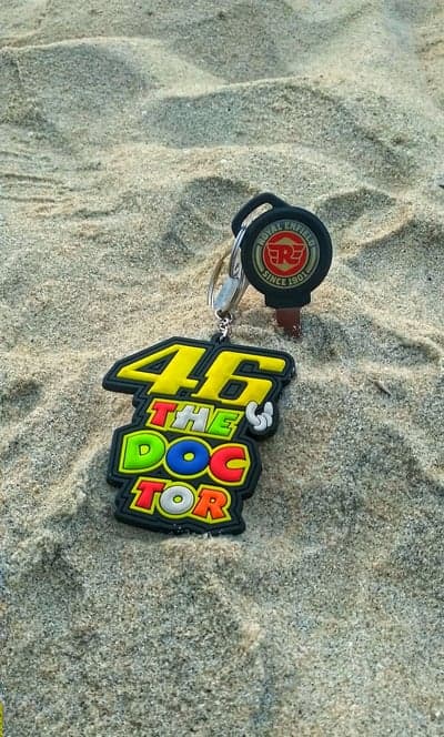 Royal Enfield "The Doctor" 46 Keychain on Sandy Beach