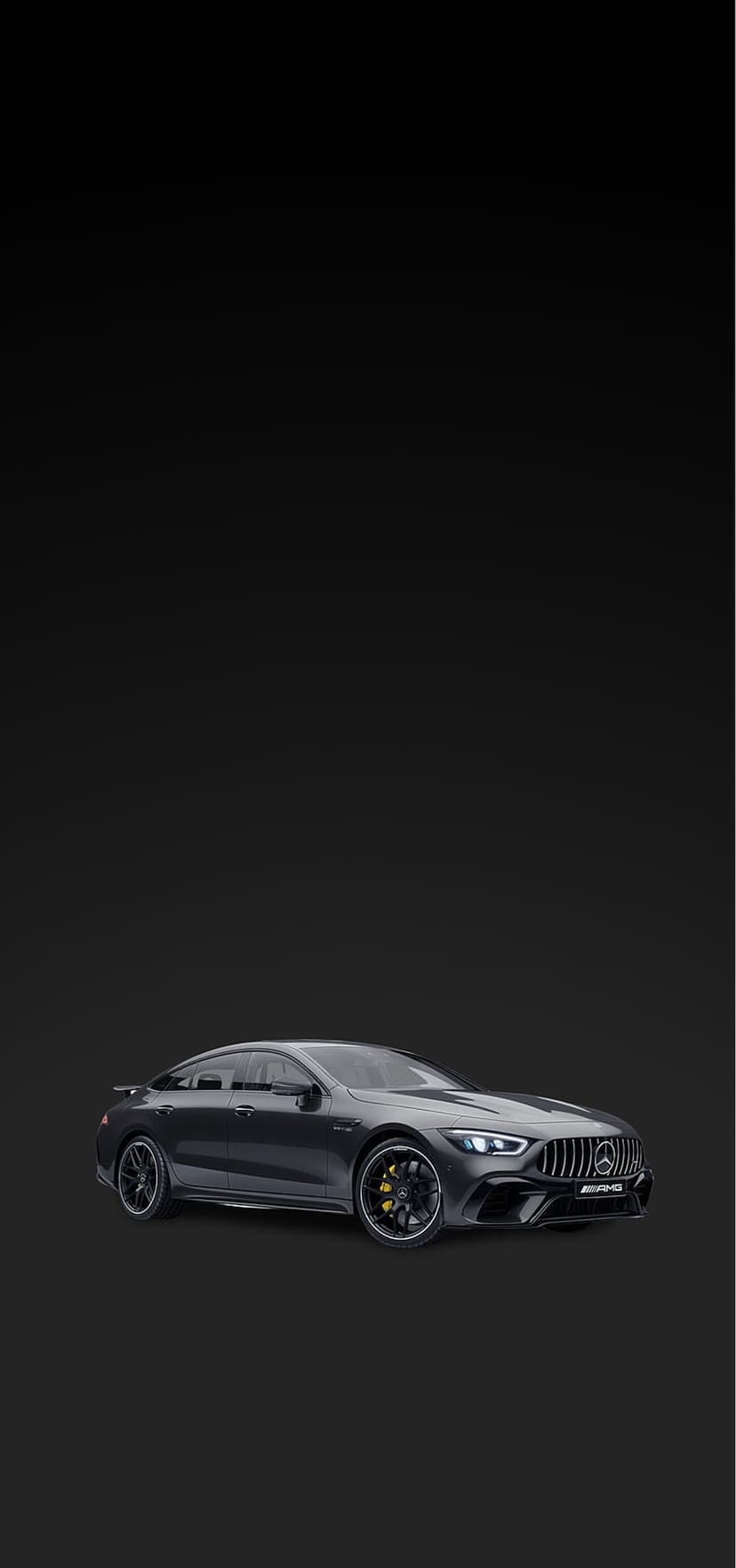 Mercedes-AMG GT 4-Door Coupe with yellow brake calipers and LED headlights on a dark minimalist background.