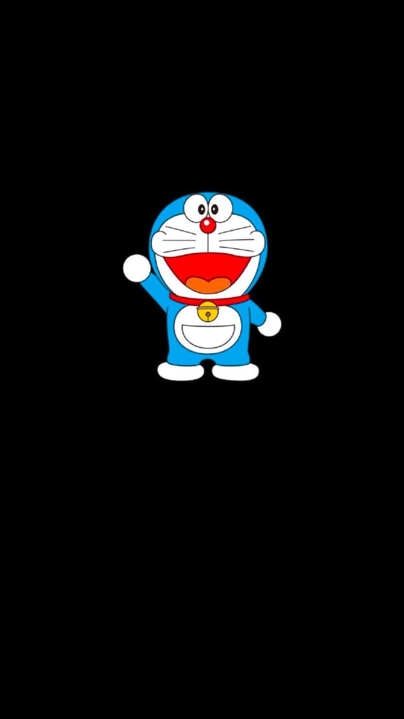 Doraemon waving with one paw raised against a solid black background, showing his blue body and yellow neck bell.