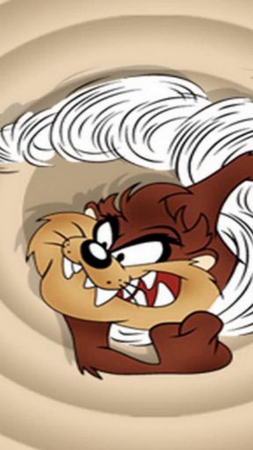 Taz the Tasmanian Devil snarling with sharp teeth inside a white swirling tornado against a simple background.