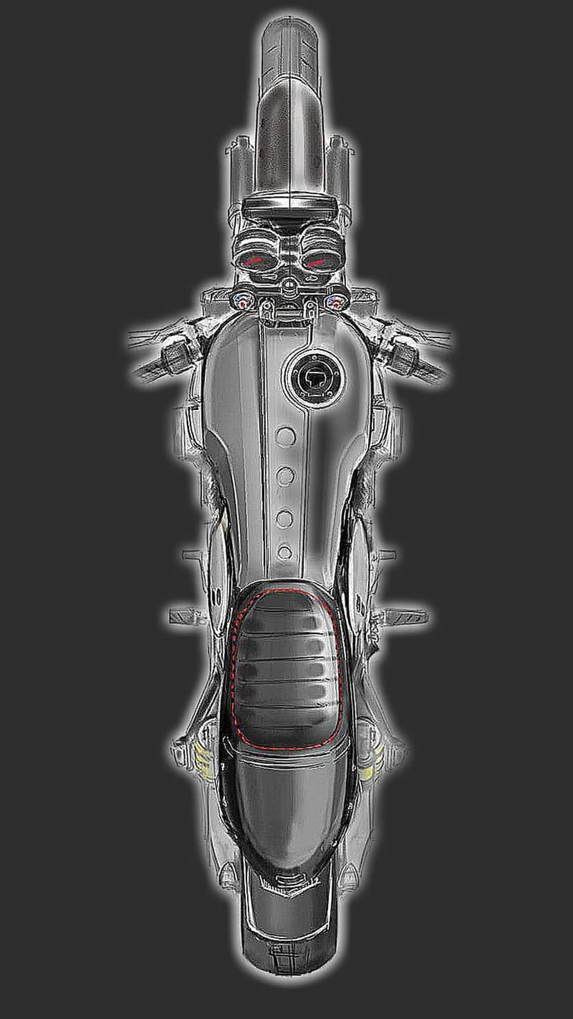 Chrome motorcycle with an elongated fuel tank and red trim viewed from an overhead perspective on a gray background.