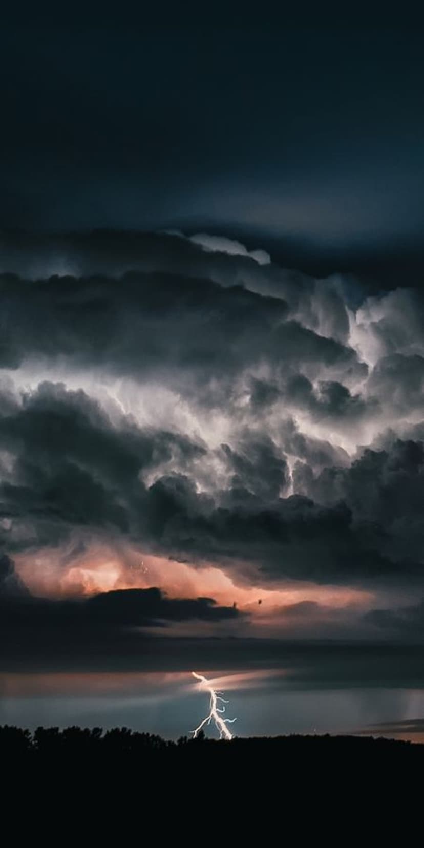 Electric Lightning Bolt Striking Stormy Horizon Wallpaper