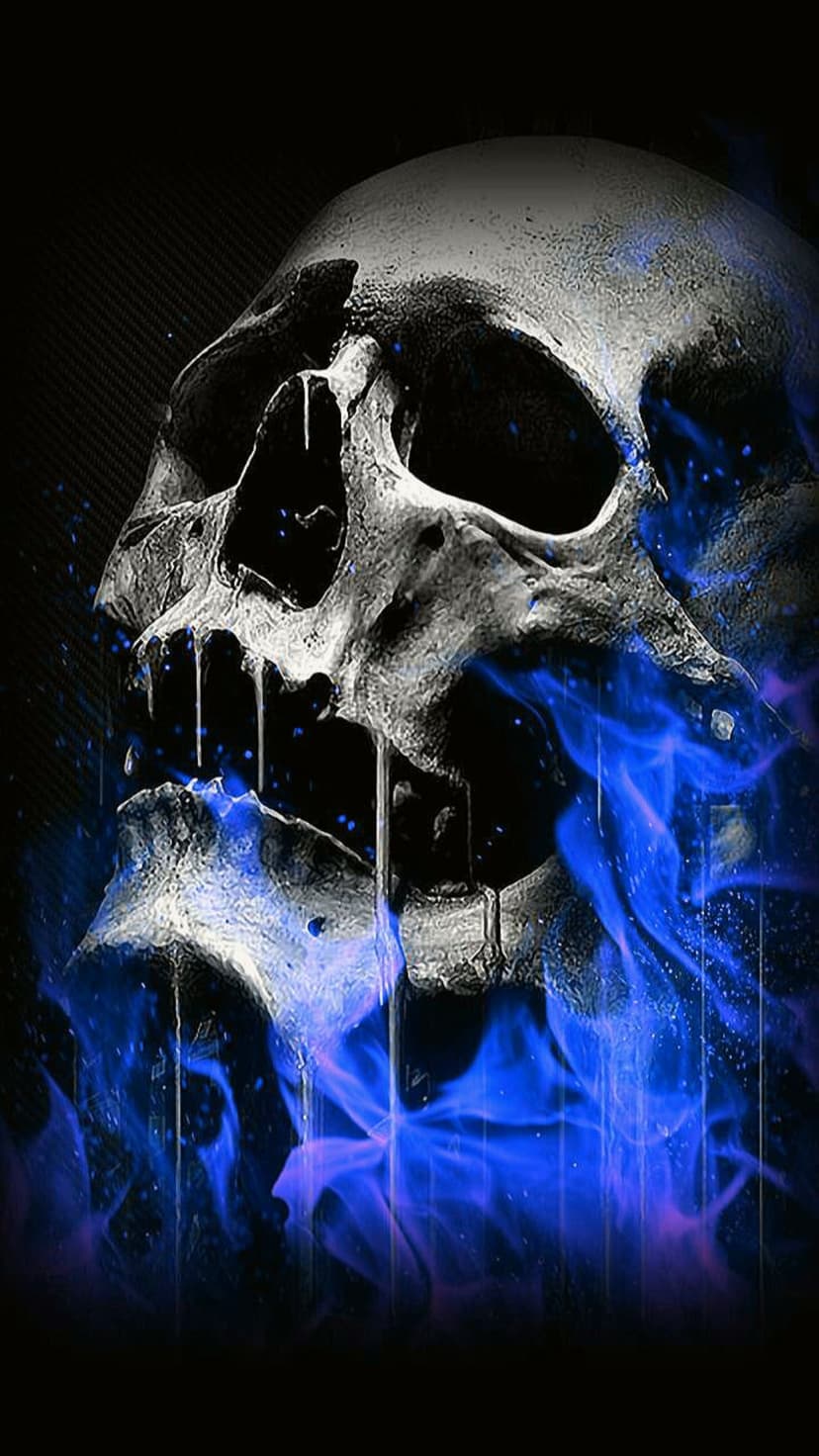 Weathered silver skull engulfed in brilliant blue flames and eerie smoke with a dark, high-contrast background.
