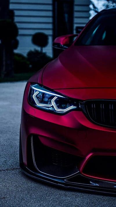 Crimson Matte Sportscar Headlights Mobile Background